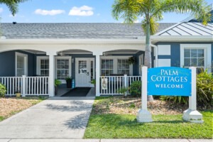 Palm Cottages exterior with sign