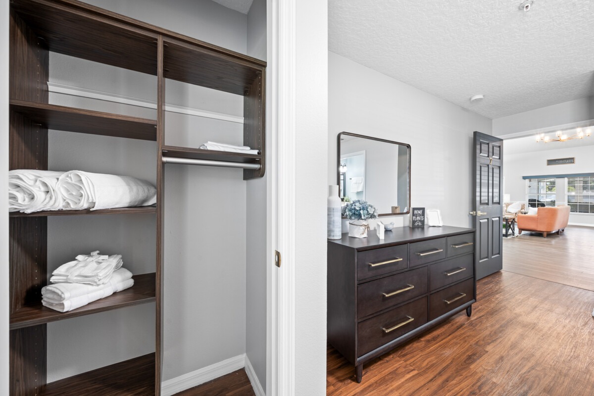 Palm cottages room with closet and dresser