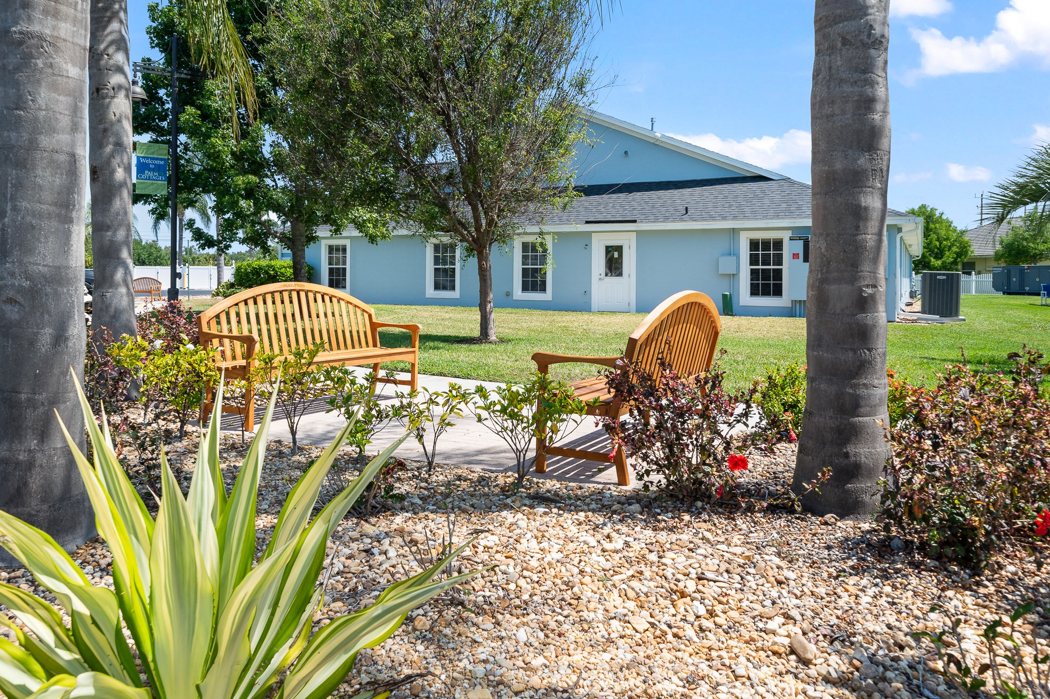 616823615-45-dsc0569139 Palm Cottages outdoor seating area