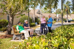 Palm cottages residents together outside