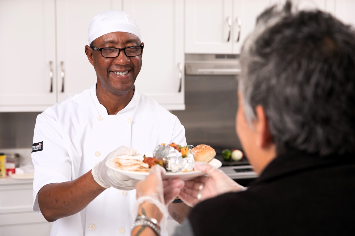 Chef serving food