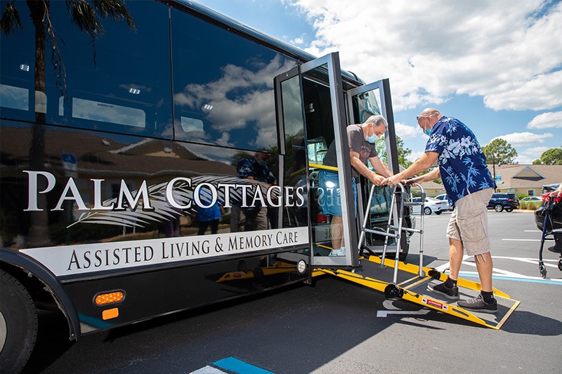 residents boarding Palm Cottages' Alzheimer's care facility van for daily outing