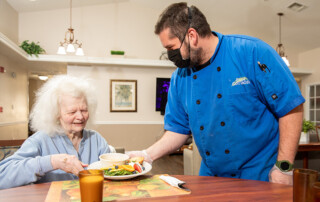 resident being served excellent meal