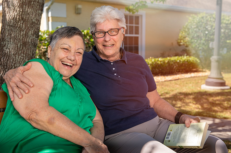 assisted living residents enjoying outdoors together