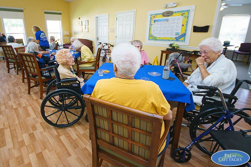 group of assisted living facility residents dining