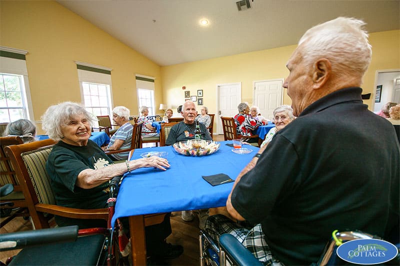 residents enjoying group, family-style dining