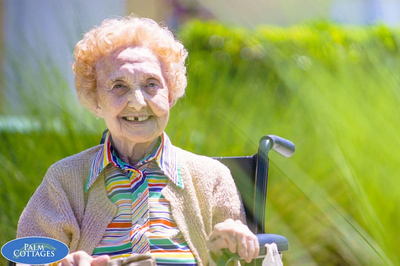 senior care facility resident sitting outside