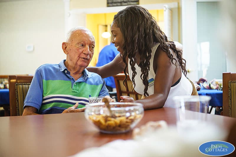 qol_team-wm memory care facility resident with caregiver